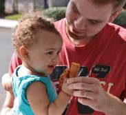 A sweet little Z88.3 listener enjoying pizza at the Dr Phillips Centra Care.