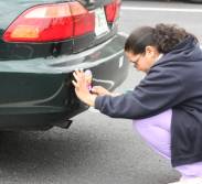 This listener was so happy to get her Hot 95.9 bumper sticker she immediately put it on her car.