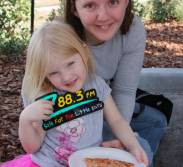 Amber and her mom stopped by to get a new Z88.3 sticker and a slice of pizza.