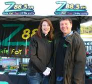 Melony McKaye Z88.3 Middays and Tim Wolf keeping warm and greeting Z88.3 listeners as walkers register.