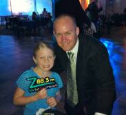 Father daughter Z88.3 listeners stopped by the Z88.3 table to say hi.