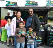 The Aybayr family stopped by the Z88.3 booth to say hi.